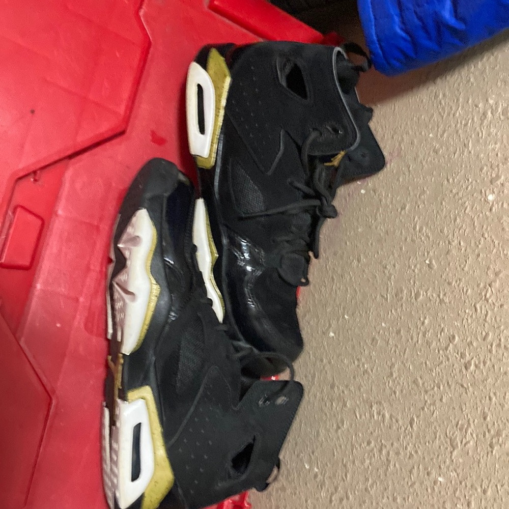 Size 7 black and gold Michael Jordan’s